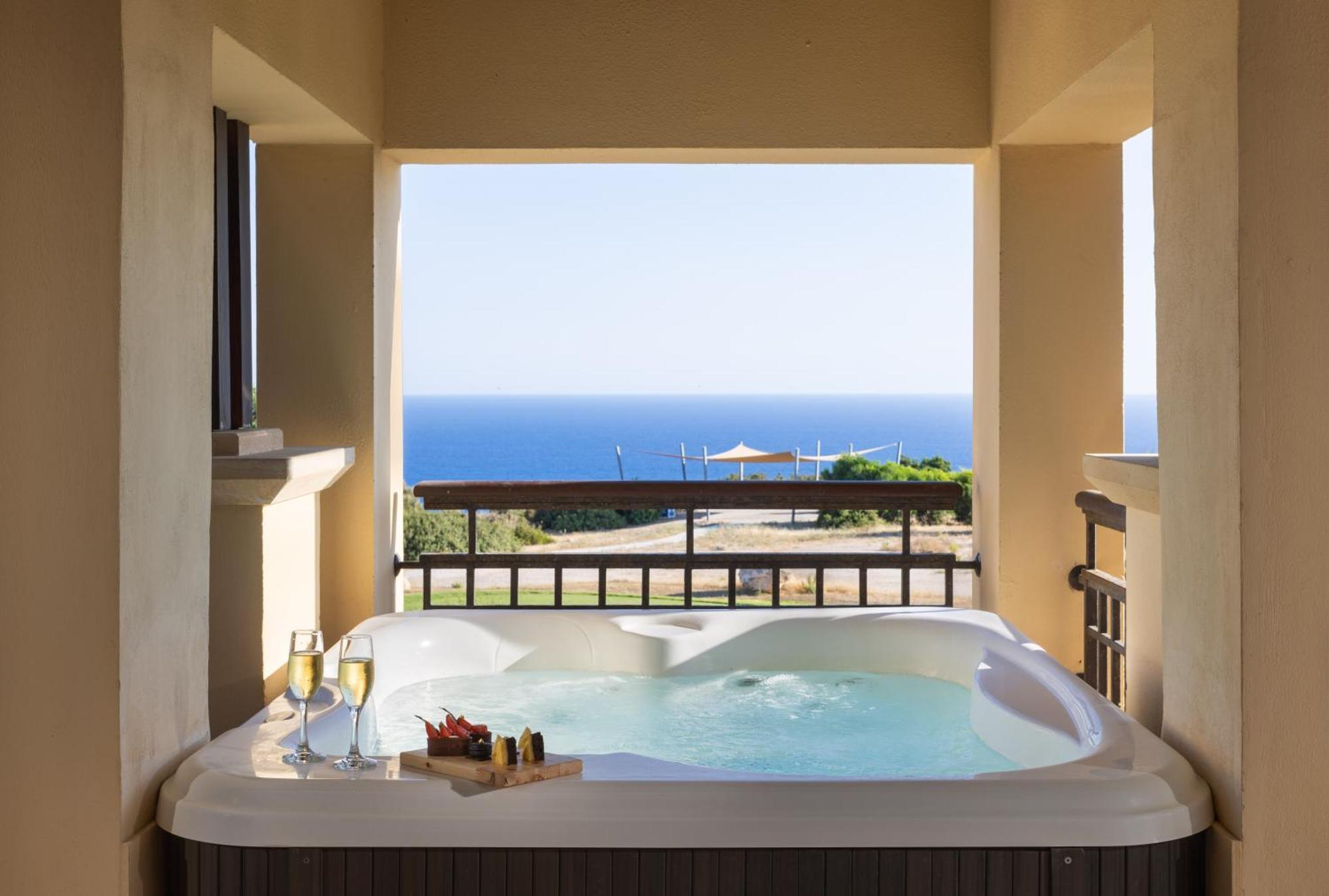 Aphrodite Suite with Jacuzzi Golf & Sea view
